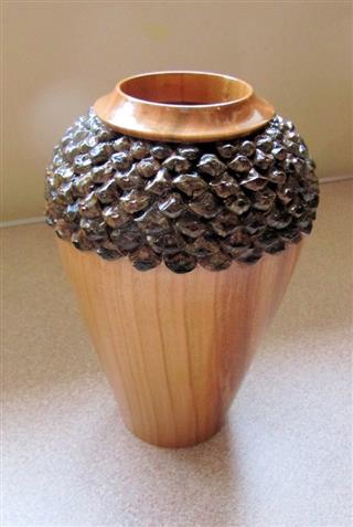 Pot with pine seed decoration by Howard Overton